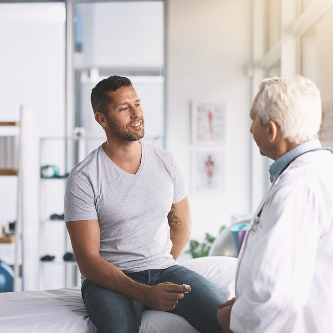 Cropped shot of a senior doctor giving his male patient a thorough checkup during his consultation